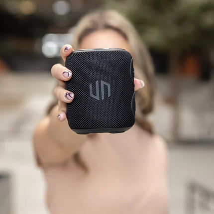 Urban Vitamin Palmdale RCS plastic 16W waterproof IPX7 audio speaker with control buttons and textured exterior.