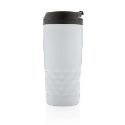  a stylish drinkware piece with modern black and white geometric patterns.