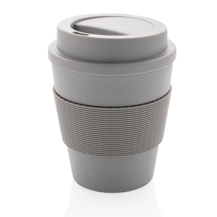  showing the sleek design and secure lid for on-the-go use.