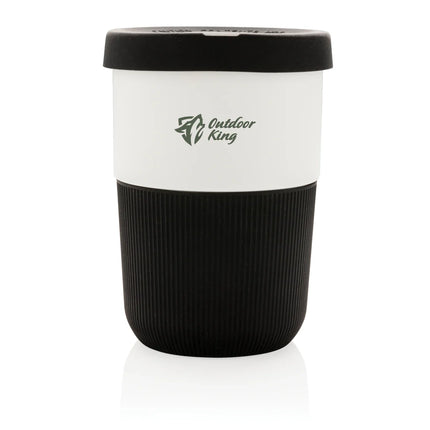  reusable drinkware with a green lid and clear body