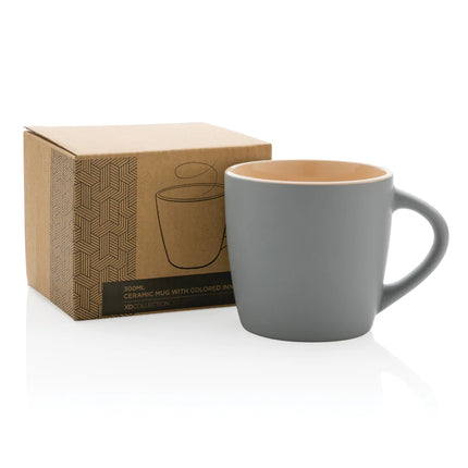  showcasing a stylish ceramic mug with vibrant interior.