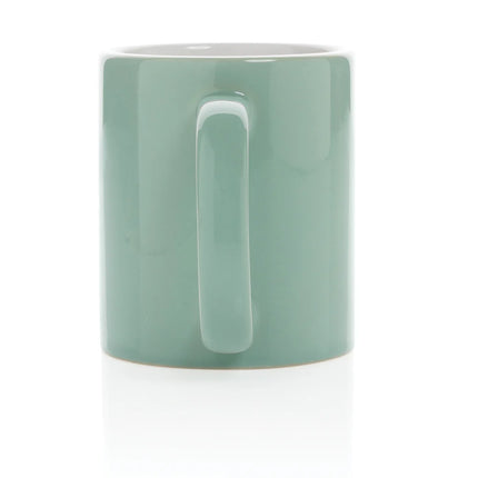  white drinkware with a smooth handle and minimalist design.