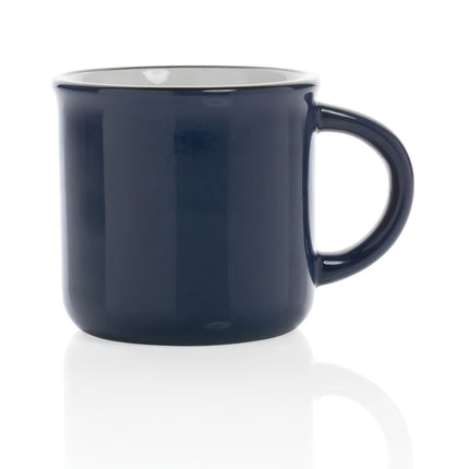  shown with a handle and decorative surface.