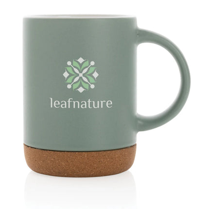  showing the mug's white ceramic body and cork bottom.