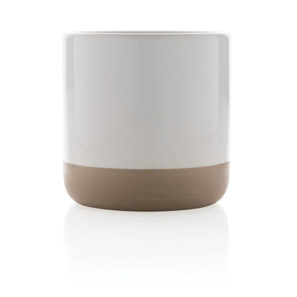  featuring a smooth finish and ergonomic handle for hot beverages.