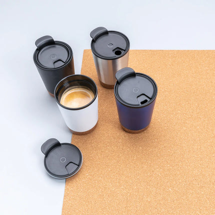  drinkware with a sleek stainless steel and cork exterior for hot beverages.