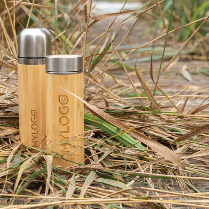  insulated drinkware with a sleek bamboo finish and secure lid.