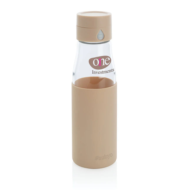  clear drinkware with measurement markings and protective black sleeve.