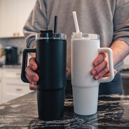  showing the tumbler with handle and clear plastic body.