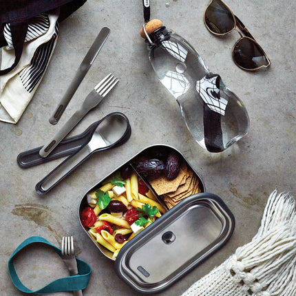  and spoons arranged on a wooden surface.