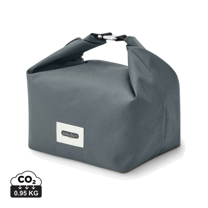 Black + Blum 6.7L insulated outdoor lunch and cooler bag with black exterior and sturdy handle for easy carrying.