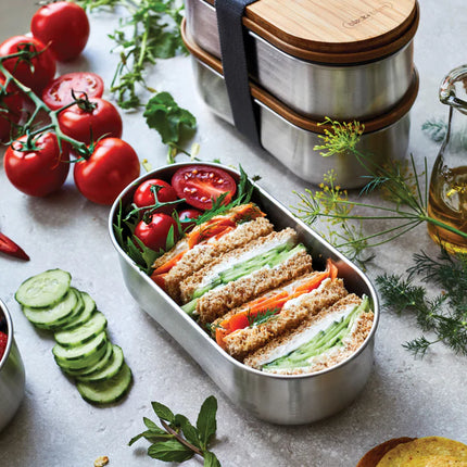 Stainless steel Black + Blum double bento box with divided compartments for home and living use