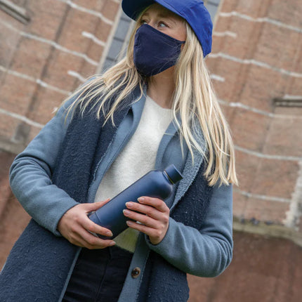  featuring a structured design and adjustable fit.