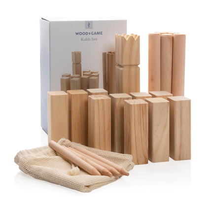 Outdoor wooden Kubb set by XD Collection with marked game pieces on a grassy field.