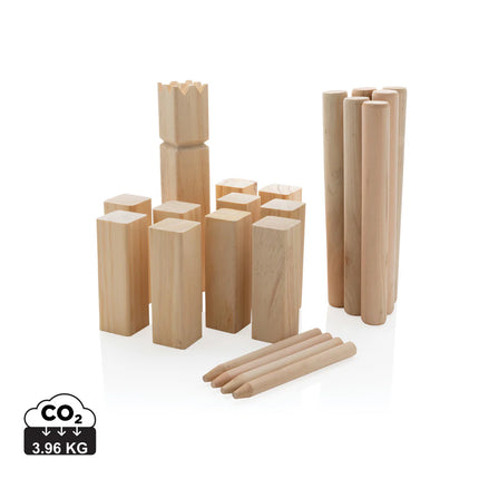 Outdoor wooden Kubb set by XD Collection with game pieces arranged on grass for outdoor play and family fun.
