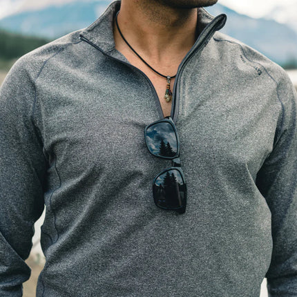  featuring sleek black frames and tinted lenses.