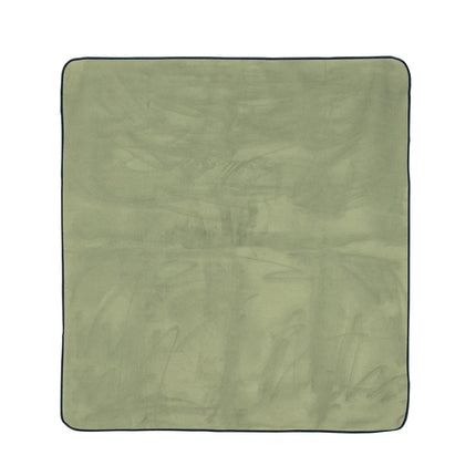  durable fabric spread on grass for outdoor relaxation.