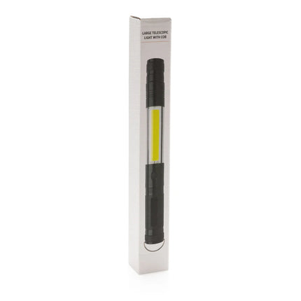  shown extended with a durable handle and adjustable focusing.