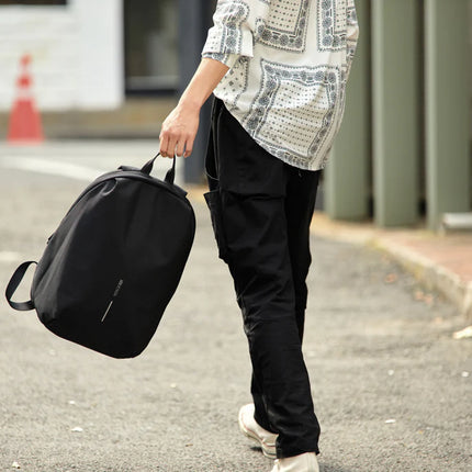  featuring secure zippers and modern travel bag design.