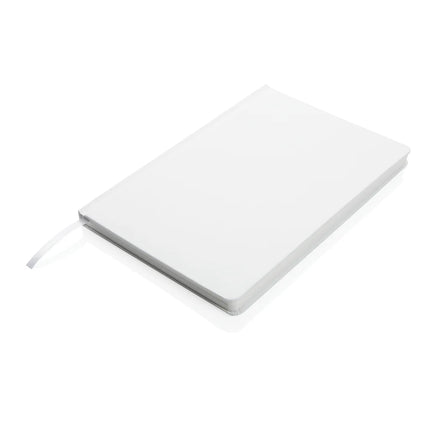 A5 Impact stone paper hardcover notebook from XD Collection with black textured cover and visible elastic closure.