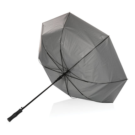 CWD XD 27-inch Impact AWARE™ RPET dual-color auto open umbrella with sturdy handle and vibrant two-tone fabric in outdoor setting