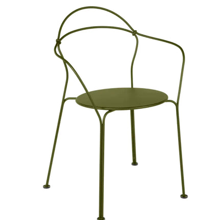 Fermob Airloop Lounge Chair in vibrant outdoor garden setting