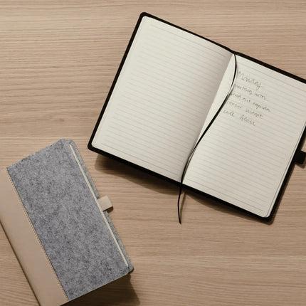 Vinga Albon GRS recycled felt A5 notebook with integrated pen holder and mélange exterior, ideal for stylish note-taking and organization.
