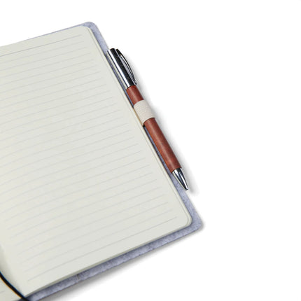 Vinga Albon GRS recycled felt A5 notebook with integrated pen holder and melange exterior, showcasing eco-friendly design.