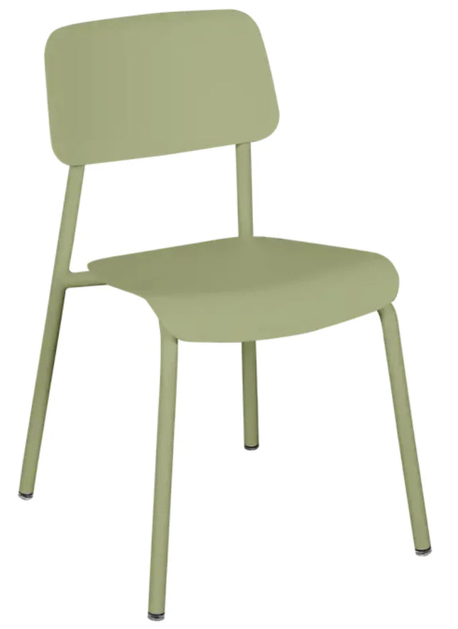 Fermob Studie outdoor chair with a sleek metal frame and colorful woven seat