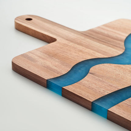 Set of 25 acacia wood service boards with resin details and handles, featuring durable epoxy resin from Custom Wood Designs.