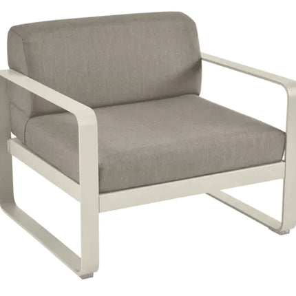 Grey Taupe Fermob Bellevie armchair with a cushioned seat and armrests