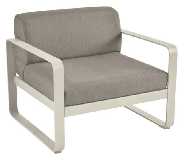 Grey Taupe Fermob Bellevie armchair with a cushioned seat and armrests