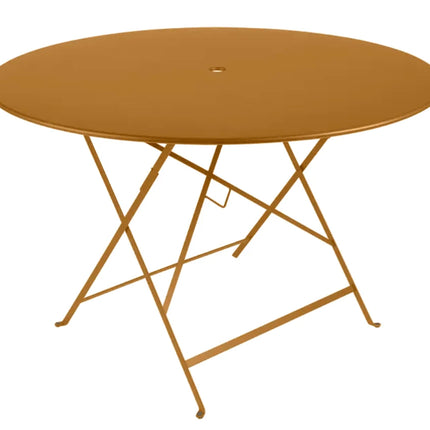  round metal table with deep gingerbread brown finish