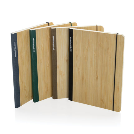 Pack of 25 black A5 bamboo notebooks by Custom Wood Designs, featuring sleek covers and eco-friendly paper for note-taking.