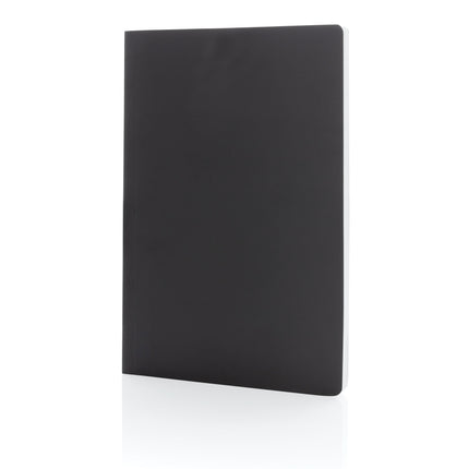 Pack of 25 black A5 softcover stone paper notebooks by Custom Wood Designs, ideal for office gifting and note-taking.