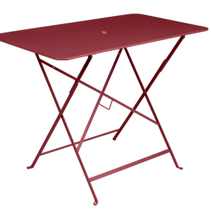 Fermob metal foldable bistro table with cactus and Parisian style design