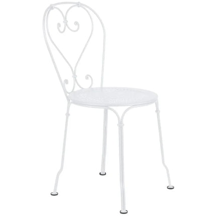  featuring a metal frame and colorful woven seat for outdoor patio use.
