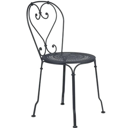 Fermob 1900 outdoor metal chair with a woven seat and backrest