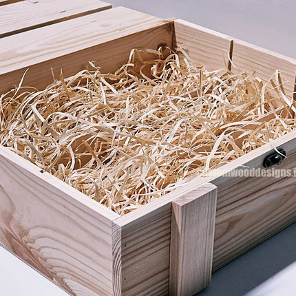 Rustic 3-bottle gift box by Custom Wood Designs with natural wood and wood wool for corporate wine or beverage gifting.