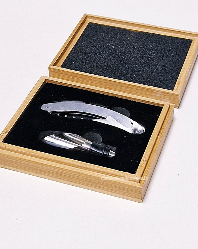 Two-piece wine set in a bamboo box by Custom Wood Designs, includes wine accessories packaged in a stylish bamboo container