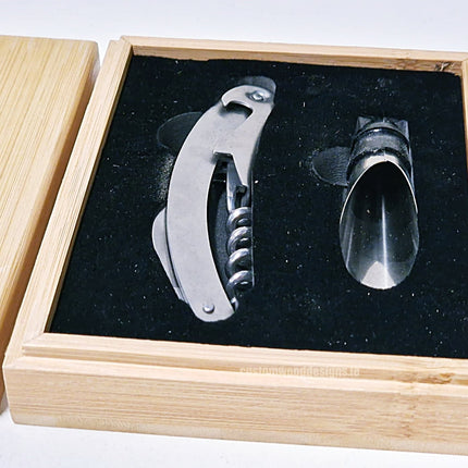 Two-piece wine set in a bamboo box by Custom Wood Designs, displayed in a pack of 25, with wine glasses and accessories inside.