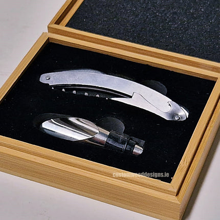 Two-piece wine set in bamboo box by Custom Wood Designs, showcasing wine accessories arranged inside the eco-friendly storage box.