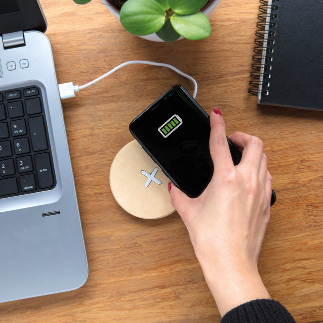 Set of 100 5W wireless wood phone chargers by Custom Wood Designs, showcasing sleek wooden finish and compact design.