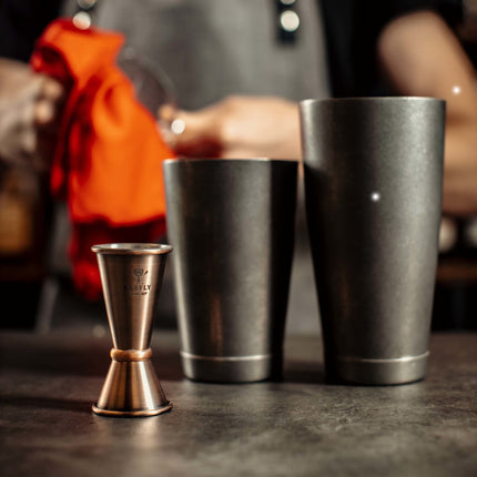 Japanese style bar measure jigger by BarFly with antique copper finish, featuring 20 ml and 40 ml measurement marks.