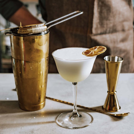 Gold-plated Japanese-style BarFly 20 ml x 40 ml bar measure jigger for precise cocktail measurements.