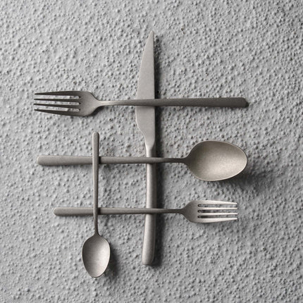 Amarone Vintage cake fork by OVE, 153 mm, with polished stainless steel handle and four tines, elegant dessert utensil.