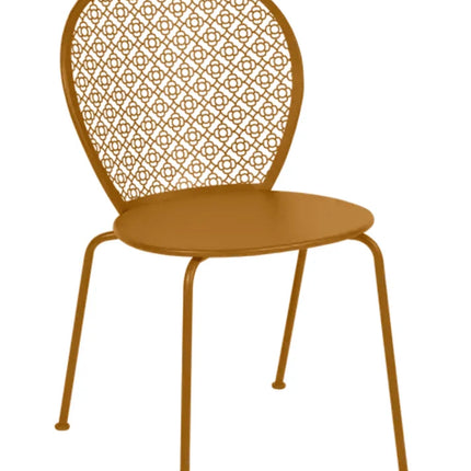 Colorful Fermob Lorette outdoor metal chair in candied orange finish