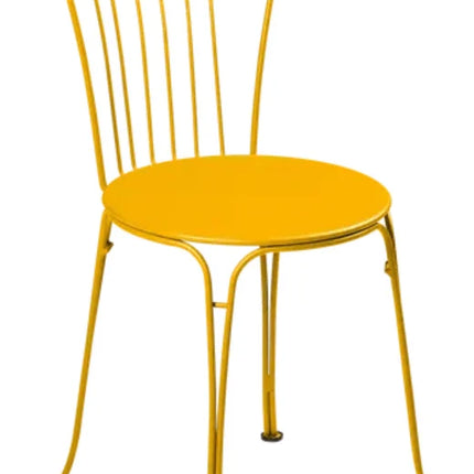 Black Fermob OPÉRA+ outdoor metal chair with a sleek black cherry finish