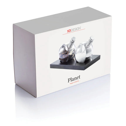 XD Design Planet pepper and salt set with round ceramic shakers featuring colorful planet designs for stylish kitchen or dining decor