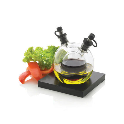 XD Design Orbit oil and vinegar set with sleek glass bottles and stainless steel pour spouts for kitchen use